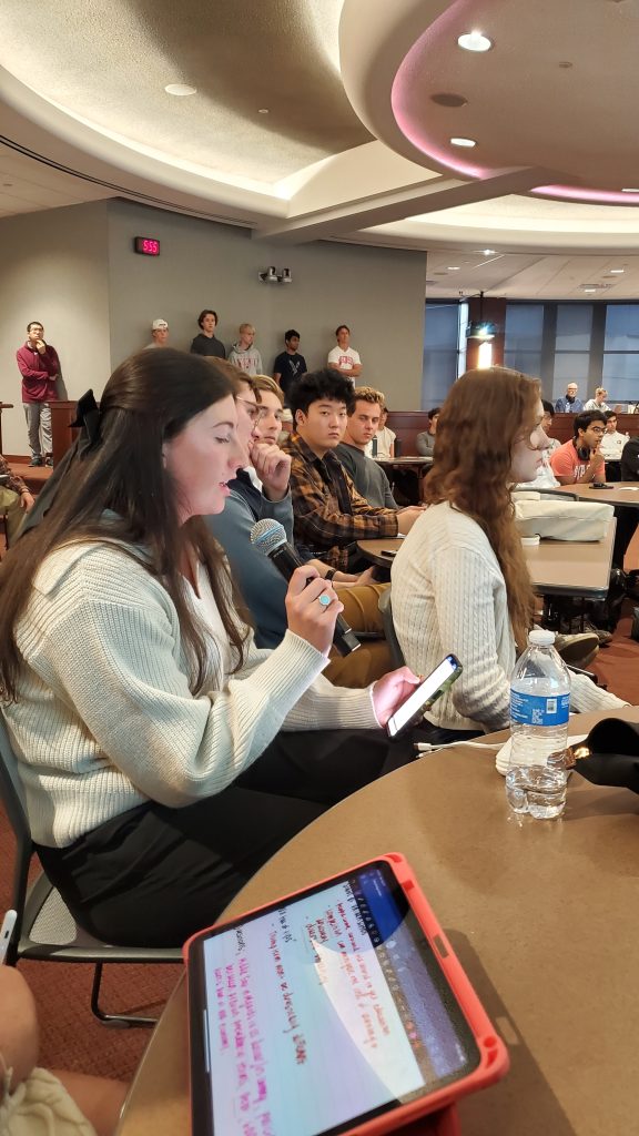 A photo of the YAF president asking the speaker questions